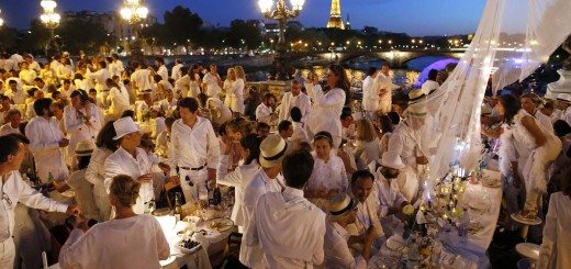 Diners gather at their tables during the Diner en Blanc in Paris