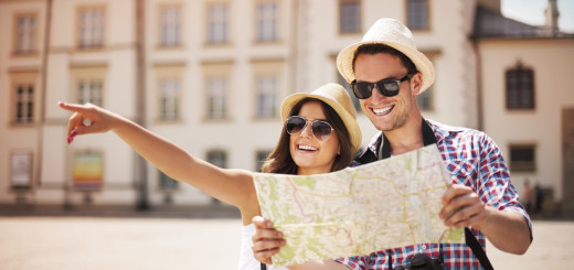 Happy tourist sightseeing city with map